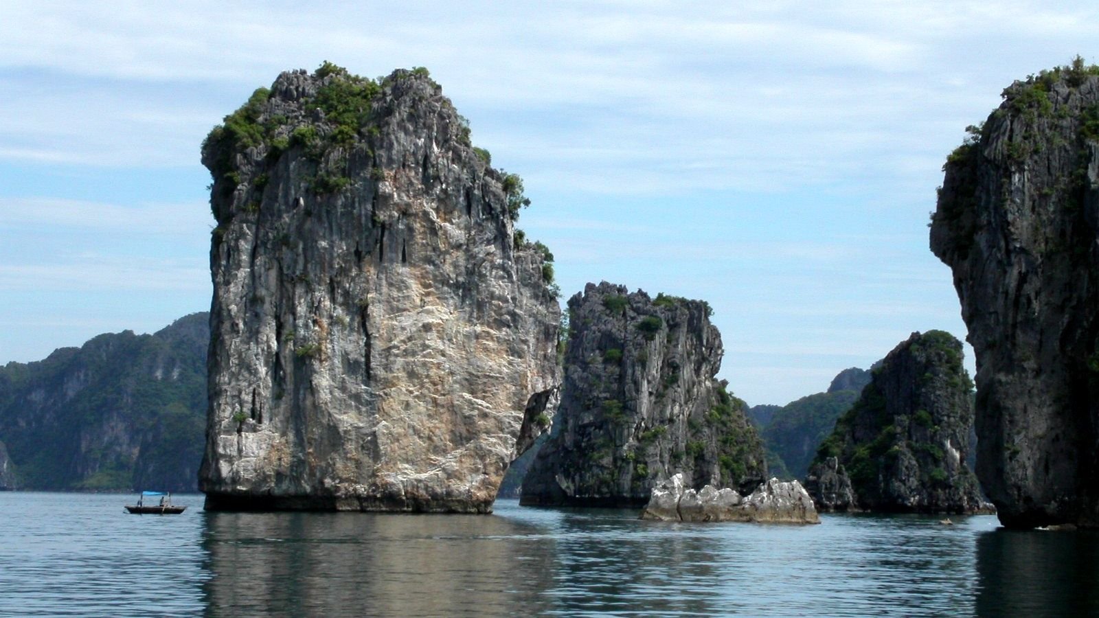 Limestone karsts rising from the water in Ha Long Bay, Vietnam